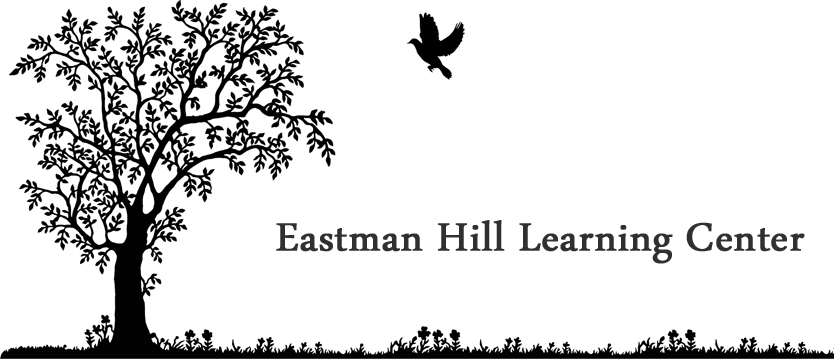 Eastman Hill Learning Center logo with silhouette of a tree and a bird flying to land on it